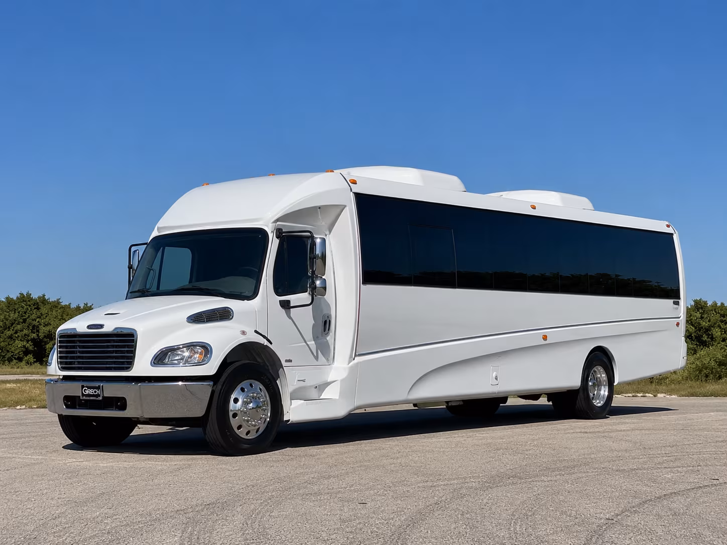 Group beside a Mercedes Sprinter limo in Oceanside
